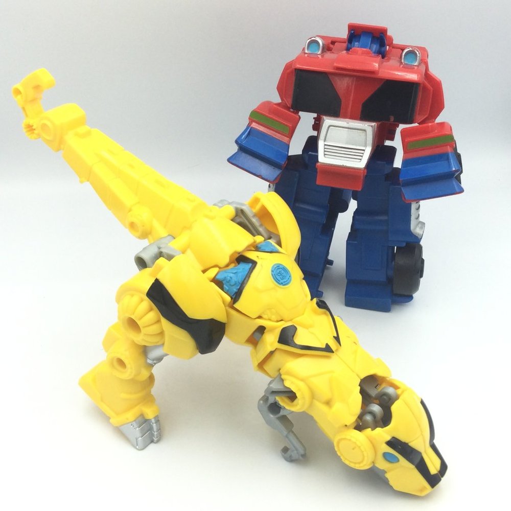 Transformers Playskool Rescue Bots Prime and Bumblebee Dinosaur Toys